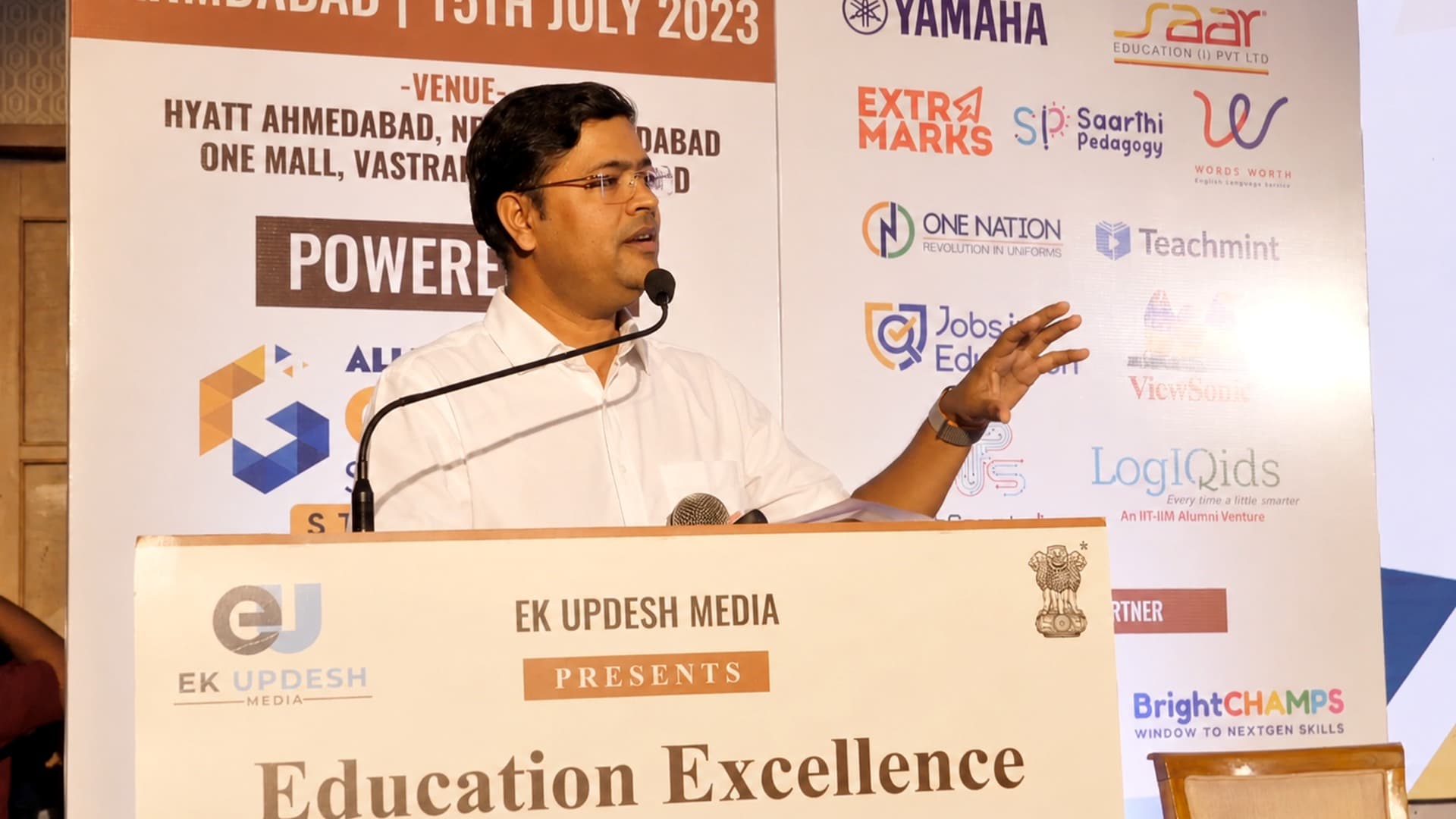 Sachin Shrivastava speaking at an Education Excellence Conclave in Ahmedabad.